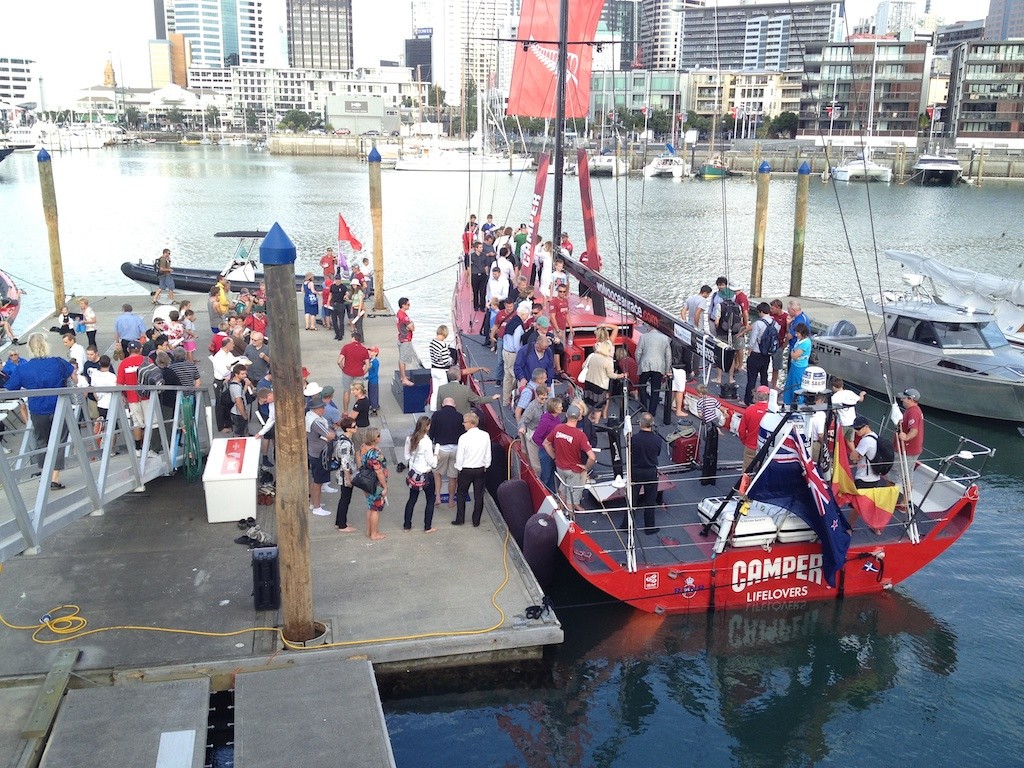 The public getting a look over Camper.  Volvo Ocean Race 2011 - 2012 © Greg Mulvaney - copyright http://www.gregmulvaney.com