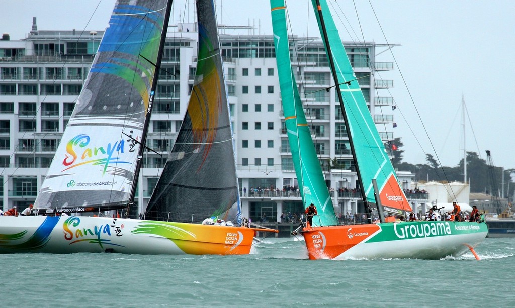 Groupama and Team Sanya cross tacks in from of a packed waterfront - Inport-Auckland-VOR - Volvo Ocean Race: In Port Race, Auckland March 17, 2012 photo copyright Richard Gladwell www.photosport.co.nz taken at  and featuring the  class