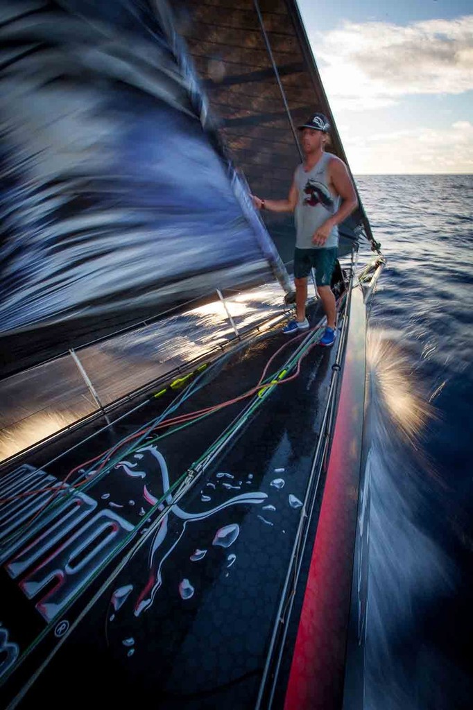 Rome Kirby guides the unfurling jib on the bow. Onboard PUMA Ocean Racing powered by BERG during leg 6 of the Volvo Ocean Race 2011-12 © Amory Ross/Puma Ocean Racing/Volvo Ocean Race http://www.puma.com/sailing