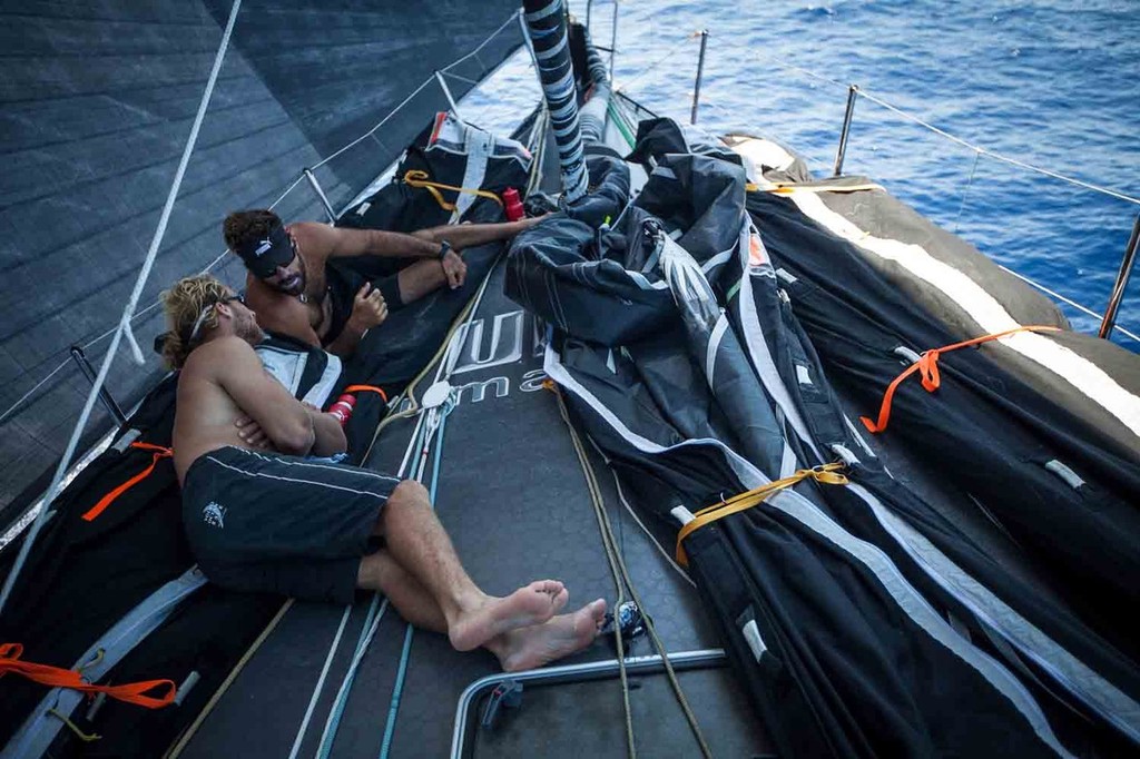 Michi Müller (close) and super-sub Shannon Falcone (far), both Puma veterans from the last race, find ample time to relax on the foredeck in the calm conditions, during leg 6 of the Volvo Ocean Race 2011-12, from Itajai, Brazil, to Miami, USA.  © Amory Ross/Puma Ocean Racing/Volvo Ocean Race http://www.puma.com/sailing