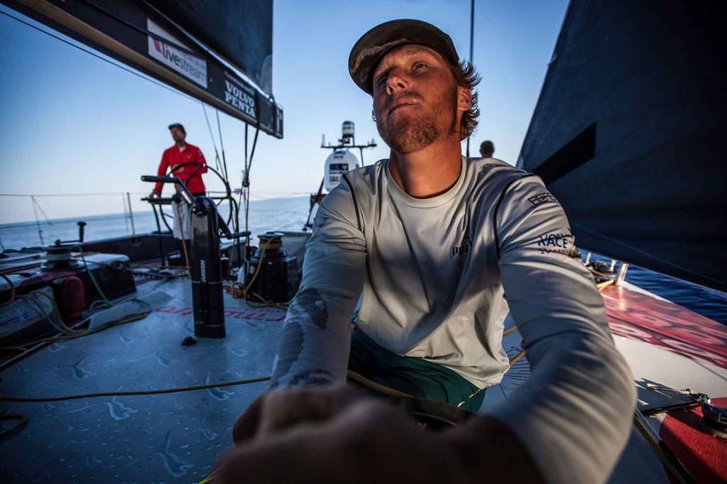 Rome Kirby trimming the Code 0 to leeward with Kelvin Harrap on the helm. Onboard PUMA Ocean Racing powered by BERG during leg 6 of the Volvo Ocean Race 2011-12, from Itajai, Brazil, to Miami, USA. (Credit: Amory Ross/PUMA Ocean Racing/Volvo Ocean Race) photo copyright Amory Ross/Puma Ocean Racing/Volvo Ocean Race http://www.puma.com/sailing taken at  and featuring the  class