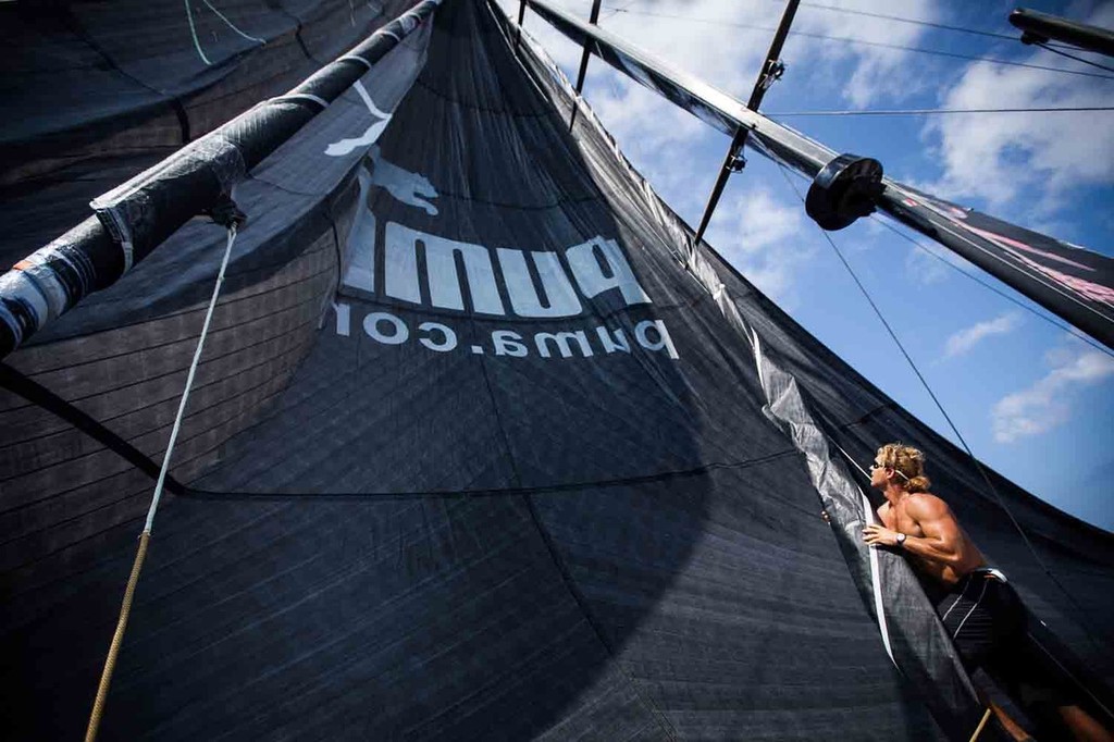 Bowman Michi Müller tends to a furled sail on its way to the tip of the rig. Onboard PUMA Ocean Racing powered by BERG during leg 6 of the Volvo Ocean Race 2011-12, from Itajai, Brazil, to Miami, USA. (Credit: Amory Ross/PUMA Ocean Racing/Volvo Ocean Race) photo copyright Amory Ross/Puma Ocean Racing/Volvo Ocean Race http://www.puma.com/sailing taken at  and featuring the  class