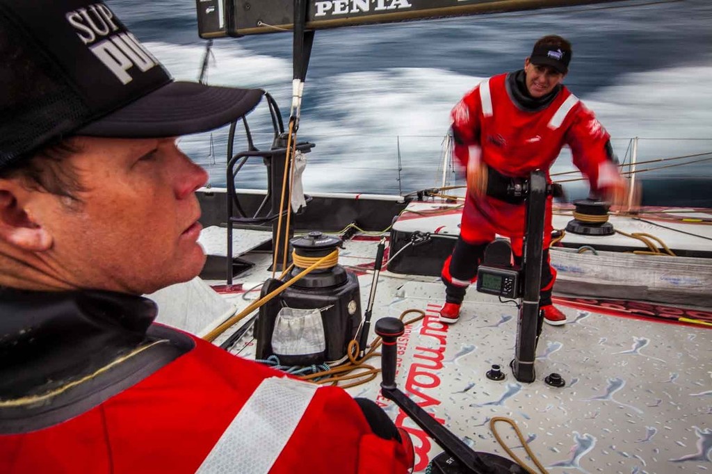 Casey Smith trims the main while Kelvin Harrap provides the muscle, onboard PUMA Ocean Racing powered by BERG during leg 8 of the Volvo Ocean Race 2011-12, from Lisbon, Portugal to Lorient, France. (Credit: Amory Ross/PUMA Ocean Racing/Volvo Ocean Race) photo copyright Amory Ross/Puma Ocean Racing/Volvo Ocean Race http://www.puma.com/sailing taken at  and featuring the  class