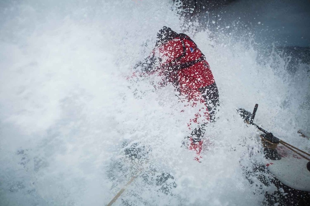 Brad Jackson meets a wall of water while trimming and grinding the mainsheet, onboard PUMA Ocean Racing powered by BERG during leg 8 of the Volvo Ocean Race 2011-12 photo copyright Amory Ross http://www.amoryross.com taken at  and featuring the  class