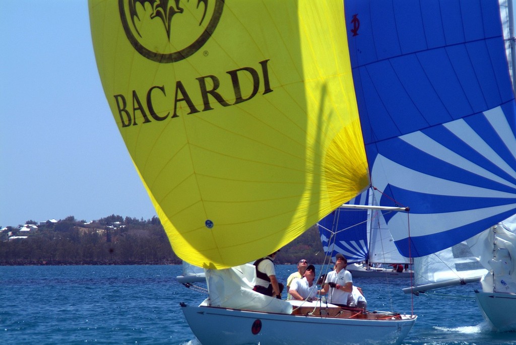 Giles Peckham of Cowes UK gets the win in the second race on day 4 of Bacardi's Bermuda International Invitational Race Week 2012. Peckham leads the 'B' Series and gets to fly the yellow spinnaker again Friday as the day's top IOD. photo copyright Talbot Wilson taken at  and featuring the  class