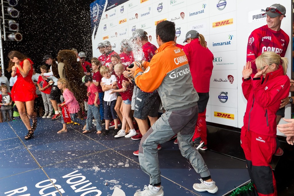 Groupama Sailing Team skipper Franck Cammas sprays champagne over winners CAMPER with Emirates Team New Zealand, skippered by Chris Nicholson from Australia, after the Auckland In-Port Race, during the Volvo Ocean Race 2011-12. (Credit: IAN ROMAN/Volvo Ocean Race) - Volvo Ocean Race, In Port Race, Auckland March 17, 2012 photo copyright Ian Roman/Volvo Ocean Race http://www.volvooceanrace.com taken at  and featuring the  class
