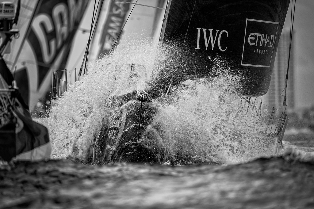 Waves crash over the deck of Abu Dhabi Ocean Racing, skippered by Ian Walker from the UK, during the PORTMIAMI In-Port Race, during the Volvo Ocean Race 2011-12. © Paul Todd/Volvo Ocean Race http://www.volvooceanrace.com