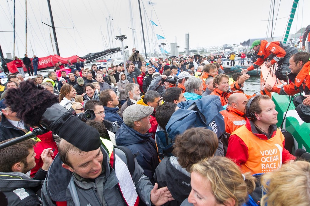 Groupama Sailing Team, skippered by Franck Cammas from France are greeted by family, fans and the media on the dock, after taking first place on leg 8, from Lisbon, Portugal, to Lorient, France, during the Volvo Ocean Race 2011-12.  © Ian Roman/Volvo Ocean Race http://www.volvooceanrace.com