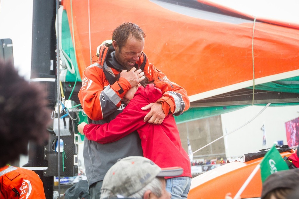 Groupama Sailing Team’s Thomas Coville from France, hugs his daughter on the dock after taking first place on leg 8, from Lisbon, Portugal, to Lorient, France, during the Volvo Ocean Race 2011-12.  © Ian Roman/Volvo Ocean Race http://www.volvooceanrace.com