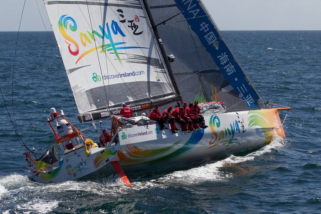 Team Sanya, skippered by Mike Sanderson from New Zealand, with the crew out on the rail, at the start of leg 9 of the Volvo Ocean Race 2011-12, from Lorient, France to Galway, Ireland.  © Ian Roman/Volvo Ocean Race http://www.volvooceanrace.com