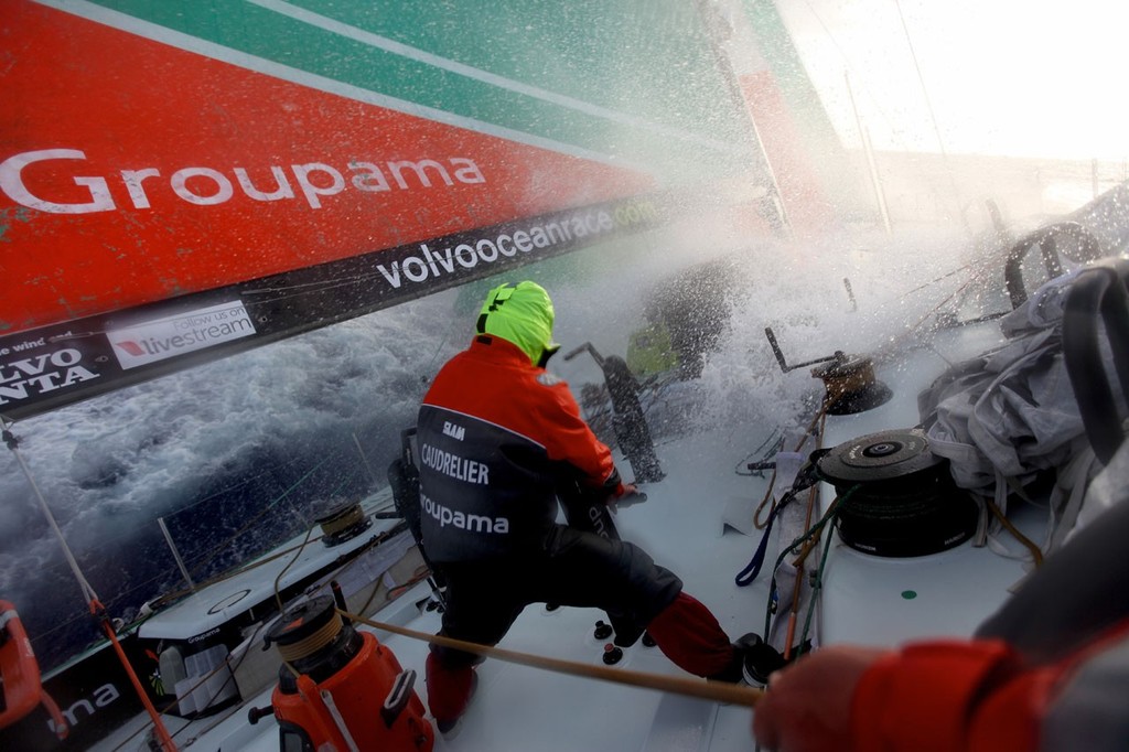 Wet atmosphere on board Groupama 4 - Volvo Ocean Race 2011-12 photo copyright Yann Riou/Groupama Sailing Team /Volvo Ocean Race http://www.cammas-groupama.com/ taken at  and featuring the  class