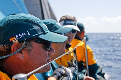 Neal McDonald and crew looking out on the rail, onboard Team Telefonica during leg 8 of the Volvo Ocean Race 2011-12, from Lisbon, Portugal to Lorient, France.  © Diego Fructuoso /Team Telefónica/Volvo Ocean Race http://www.volvooceanrace.com