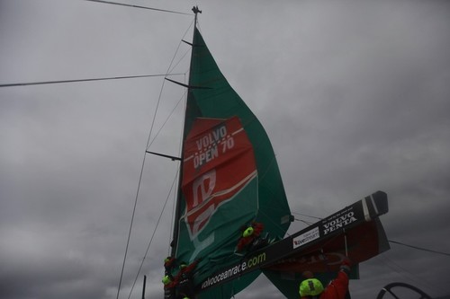 Brad Marsh is sent up the mast to try and free a stuck mainsail, onboard Groupama Sailing Team during leg 8 of the Volvo Ocean Race 2011-12, from Lisbon, Portugal to Lorient, France.  © Yann Riou/Groupama Sailing Team /Volvo Ocean Race http://www.cammas-groupama.com/