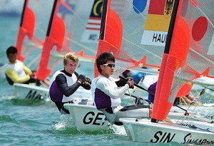 Singapore's Darren Choy ahead of Germany's Florian Haufe at the 2010 Youth Olympic Games (YOG) racing in Byte CII's. photo copyright SPH-SYOGOC / Alphonsus Chern http://www.byteclass.org taken at  and featuring the  class