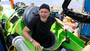 Filmmaker and National Geographic Explorer-in-Residence James Cameron emerges from the DEEPSEA CHALLENGER submersible after his successful solo dive to the Mariana Trench, the deepest part of the ocean. The dive was part of DEEPSEA CHALLENGE, a joint scientific expedition by Cameron, the National Geographic Society and Rolex to conduct deep-ocean research. photo copyright Mark Thiessen National Geographic taken at  and featuring the  class