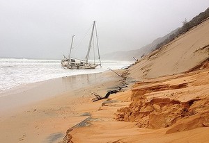 Beached yacht south of Rainbow Bay - photo by Renee Pilcher, Gympie Times photo copyright  SW taken at  and featuring the  class