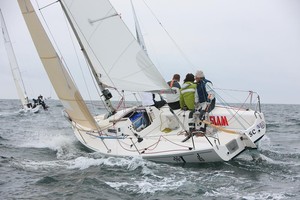 Richard Soper and his Exmouth based crew power upwind photo copyright Tim Wright taken at  and featuring the  class