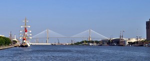The 191-foot Barquentine Dewaruci (Surbaya, Indonesia) and Nova Scotia’s Theodore Tug docked in Savannah, Ga., with the Talmadge Bridge in the background for Tall Ships America’s 2012 Tall Ships Challenge photo copyright Jennifer Spring http://www.tallshipsamerica.org/ taken at  and featuring the  class