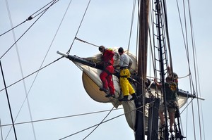 The crew douses sails aboard 180-foot HMS Bounty photo copyright Jennifer Spring http://www.tallshipsamerica.org/ taken at  and featuring the  class