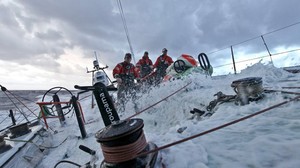 A wet sunset, onboard Groupama 4 during leg 7 of the Volvo Ocean Race 2011-12 photo copyright Yann Riou/Groupama Sailing Team /Volvo Ocean Race http://www.cammas-groupama.com/ taken at  and featuring the  class