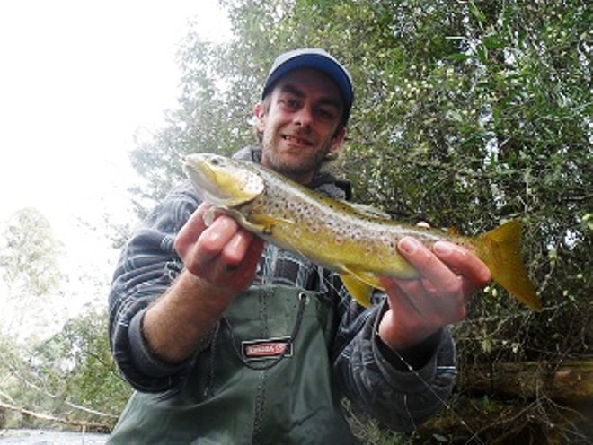 One of the team winners with his brown trout. © Carl Hyland
