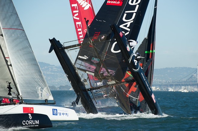 Oracle Team USA digs the bows in and capsizes at the first mark in the first fleet race of day four of the America’s Cup World Series, San Francisco.  ©  SW