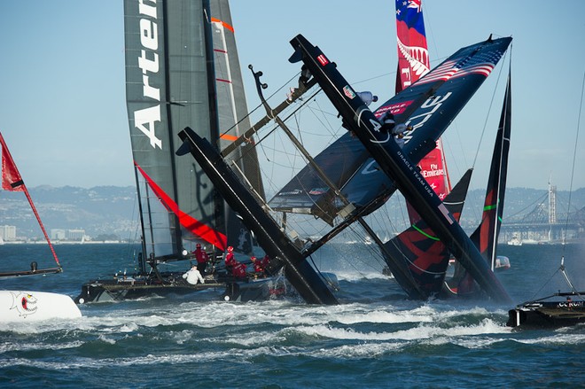 Oracle Team USA digs the bows in and capsizes at the first mark in the first fleet race of day four of the America’s Cup World Series, San Francisco.  ©  SW