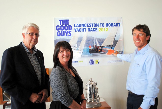 Melbourne yachtsman David Ellis points out his yacht Audi Penfold Sports on the poster for the L2H to Peter Newman and Donelda Niles from the Tamar Yacht Club. © Rob Cruse