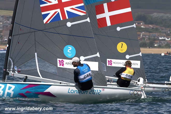 Olympic Games August 2012. Triple Olympic gold medallist Ben Ainslie with a crucial lead ahead of arch-rival Jonas Hoegh-Christensen to win a late Gold medal in the Finn class. © Ingrid Abery http://www.ingridabery.com