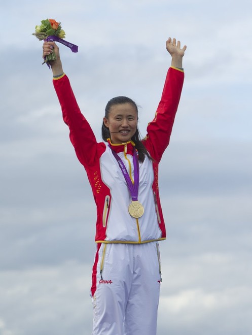 Lijia Xu (CHN) who won Gold the Medal today, 06.08.12, in the Medal Race Women’s One Person Dinghy (Laser Radial) event in The London 2012 Olympic Sailing Competition.<br />
 © onEdition http://www.onEdition.com