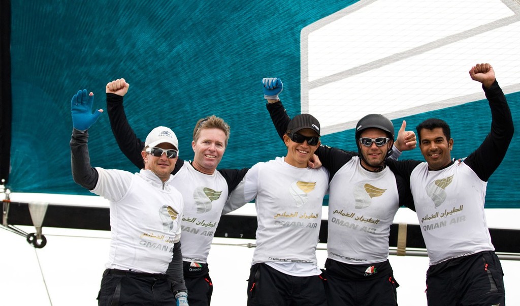 Oman Air celebrating after winning the act today, skippered by Morgan Larson (USA), with tactician Will Howden (GBR), mainsail trimmer Charlie Ogletree (USA), headsail trimmer Andy Maloney (NZL) and bowman Nasser Al Mashari (OMA). © Lloyd Images http://lloydimagesgallery.photoshelter.com/