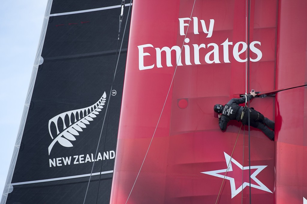 Emirates Team New Zealand sailing the AC72 on the Hauraki Gulf on the second day of sailing. A bang brings an end to sailing as a part in the wing gives way.Richard Meacham goes aloft to check the damage and take some photos for the designers. 3/8/2012 photo copyright Chris Cameron/ETNZ http://www.chriscameron.co.nz taken at  and featuring the  class