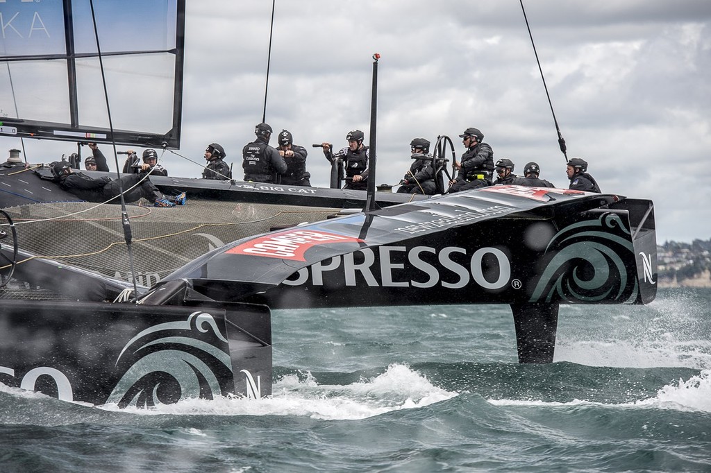 Skipper Dean Barker has a very light touch on the wheel of the AC72 during the race session aboard Emirates Team New Zealand AC72 on the Hauraki Gulf. photo copyright Chris Cameron/ETNZ http://www.chriscameron.co.nz taken at  and featuring the  class