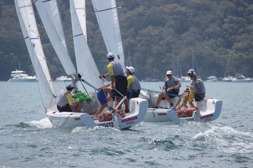 Dave Hazard, right, in action against Steele - 20th Harken International Youth Match Racing Championships photo copyright Damian Devine taken at  and featuring the  class