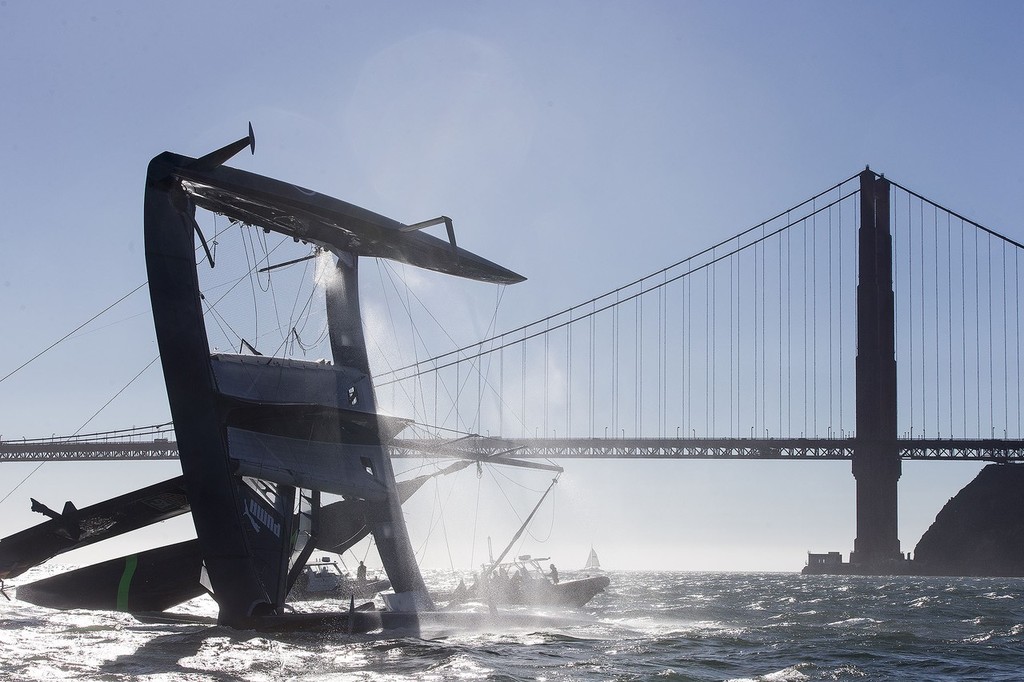 USA AC 72 capsizes during training in San Francisco Bay and is pushed out of the bay by the tide current as the team try to salvage the platform. Oct 16, 2012 photo copyright Guilain Grenier Oracle Team USA http://www.oracleteamusamedia.com/ taken at  and featuring the  class
