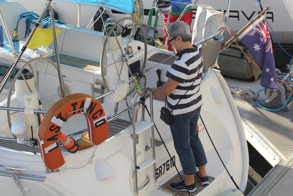 A crew member of Last Tango preparing the Yacht for race on Thursday photo copyright Emma Kennedy SeaLink Magnetic Island Race Week 2012 taken at  and featuring the  class