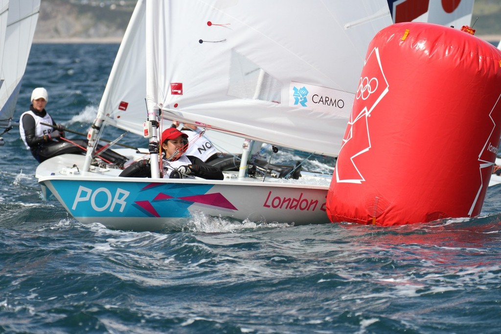 July 30, 2012 Weymouth, England - Womens Singlehander (Laser Radial)  Sara Carmo (POR) struggles around a mark photo copyright Richard Gladwell www.photosport.co.nz taken at  and featuring the  class