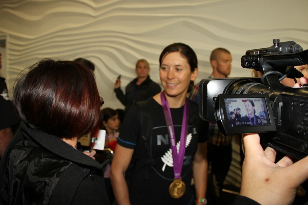 470 Womens Gold Medalist, Jo Aleh being interviewed on her return to Auckland © Richard Gladwell www.photosport.co.nz