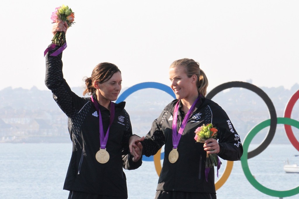  August 10, 2012 - Weymouth, England - Jo Aleh and Olivia Powrie after the presentation of their Gold Medal for the Womens 470 photo copyright Richard Gladwell www.photosport.co.nz taken at  and featuring the  class
