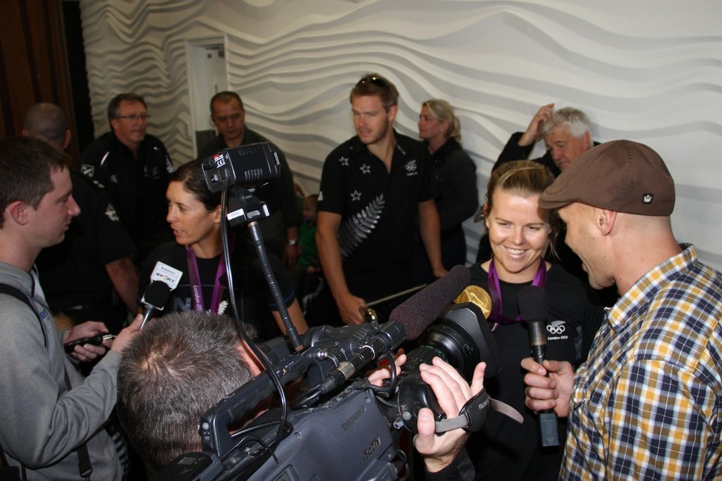 470 Womens Gold Medalists, Jo Aleh (left) and Olivia Powrie (right) being interviewed on their return to Auckland © Richard Gladwell www.photosport.co.nz