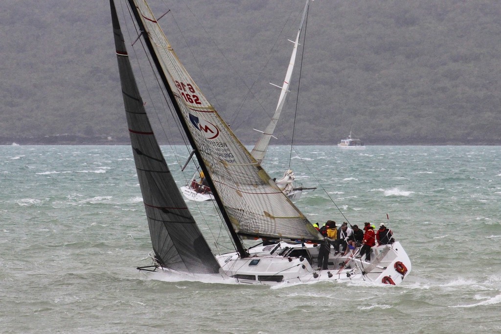Satellite Spy digs down into a big sea - RNZYS Winter Series - Final Race September 15, 2012 photo copyright Richard Gladwell www.photosport.co.nz taken at  and featuring the  class