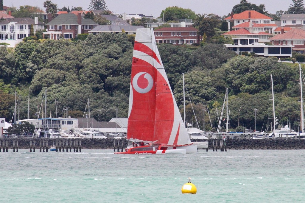 TeamVodafoneSailing crossing the finsih line off Royal Akarana YC (background) around 1330hrs on Saturday afternoon to be first home in the 320nm classic photo copyright Richard Gladwell www.photosport.co.nz taken at  and featuring the  class