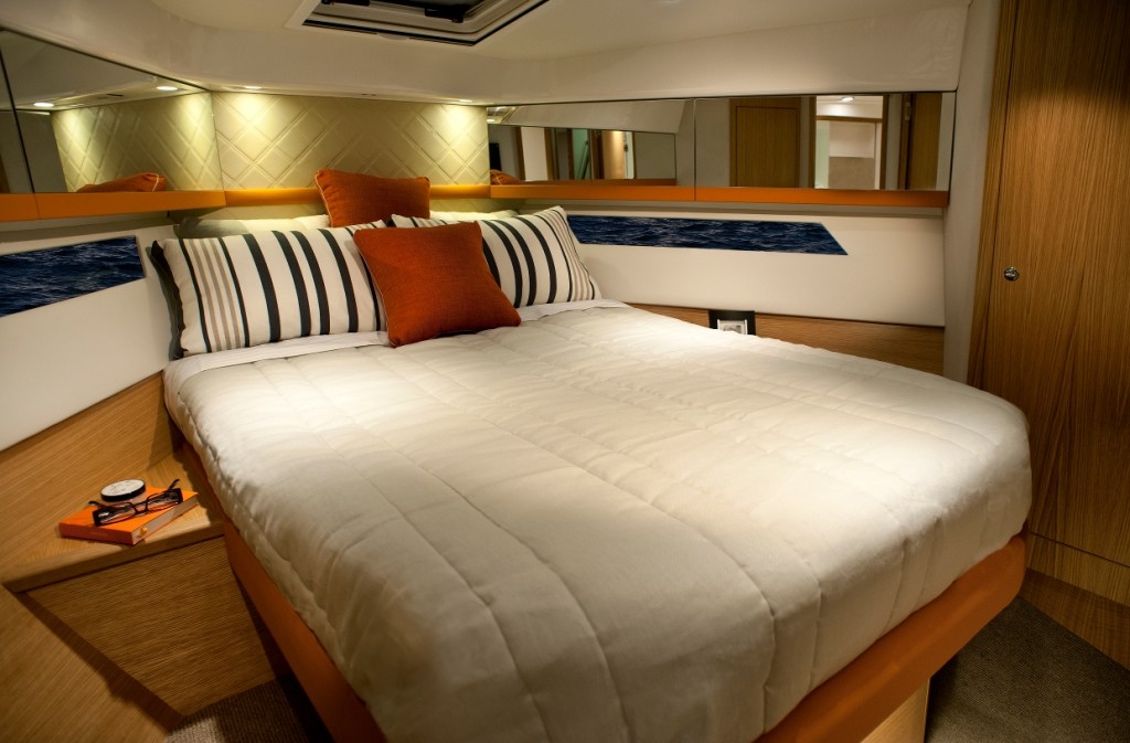 The opulent master stateroom forward has a plush island bed with larger under-bed drawers photo copyright Stephen Milne taken at  and featuring the  class