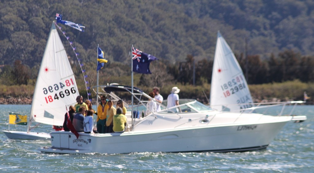 Tom Slingsby arrives by boat at Gosford Sailing Club photo copyright Sail-World.com /AUS http://www.sail-world.com taken at  and featuring the  class