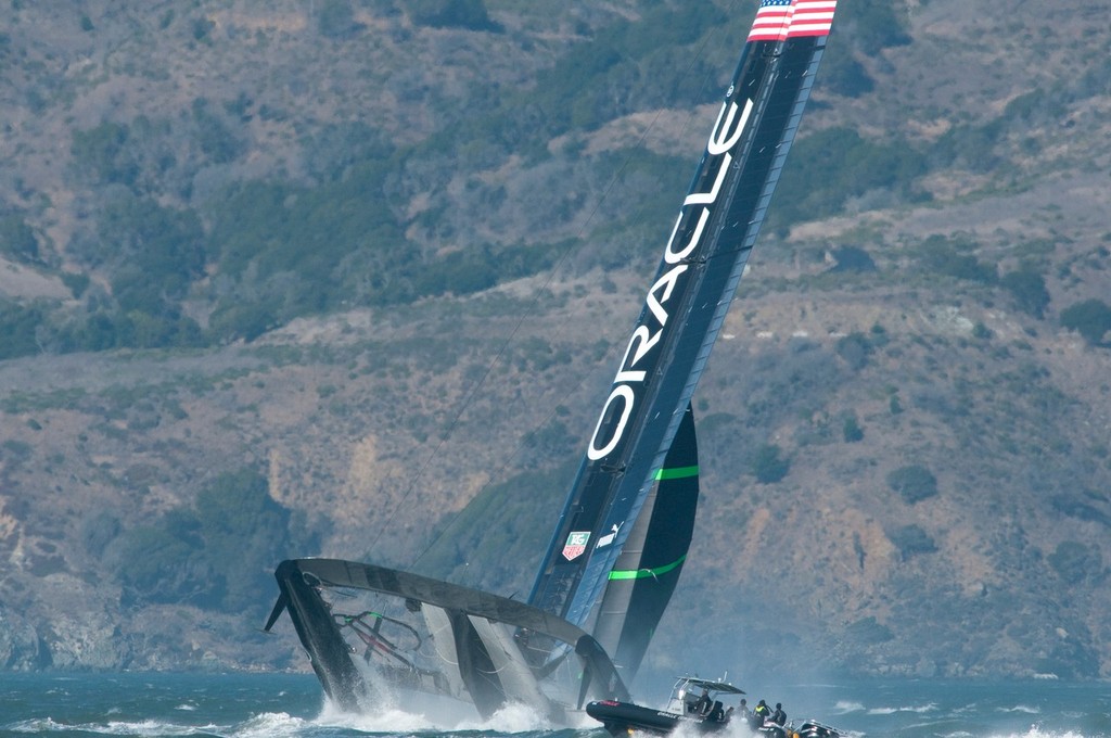 Getting close to the point of no return - Oracle Team USA capsize AC72 Oct 16, 2012 photo copyright Erik Simonson www.pressure-drop.us http://www.pressure-drop.us taken at  and featuring the  class