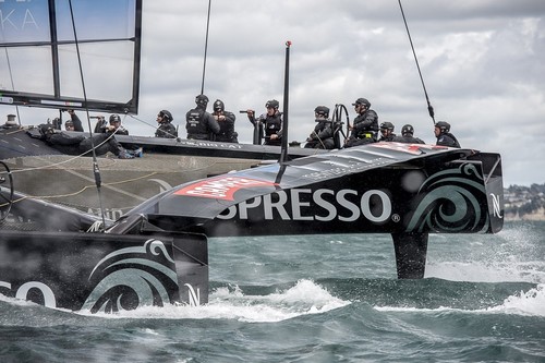 Skipper Dean Barker has a very light touch on the wheel of the AC72 during the race session aboard Emirates Team New Zealand AC72 on the Hauraki Gulf.  © Chris Cameron/ETNZ http://www.chriscameron.co.nz