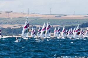 Laser Radial Fleet - London 2012 Olympic Sailing Competition photo copyright Thom Touw http://www.thomtouw.com taken at  and featuring the  class