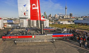 Launch of the new Luna Rossa AC72 wingsailed catamaran on Friday, Oct. 26, 2012, in Auckland, New Zealand. 
The Luna Rossa catamaran, skippered by Max Sirena, is the Italian Challenger to the 34th America's Cup that will be held in San Francisco in 2013.
Miuccia Prada christens the boat.
(Photo: LUNA ROSSA / Carlo Borlenghi) - Luna Rossa 2012 launch in Auckland photo copyright Luna Rossa/Studio Borlenghi taken at  and featuring the  class