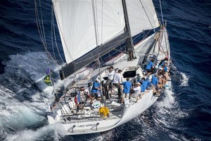 The crew of MED SPIRIT (RUS) working onboard - 2012 Rolex Middle Sea Race photo copyright  Rolex/ Kurt Arrigo http://www.regattanews.com taken at  and featuring the  class