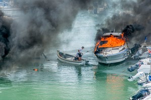 A power boat catches fire and explodes in the El Campello marina on Sunday the 2nd of September in front of hundreds of people on the Costa Blanca near Alicante, Spain. Photo credit must read: ©Paul Todd/OUTSIDEIMAGES.COM 
OUTSIDE IMAGES photo agency. photo copyright Paul Todd/Outside Images http://www.outsideimages.com taken at  and featuring the  class